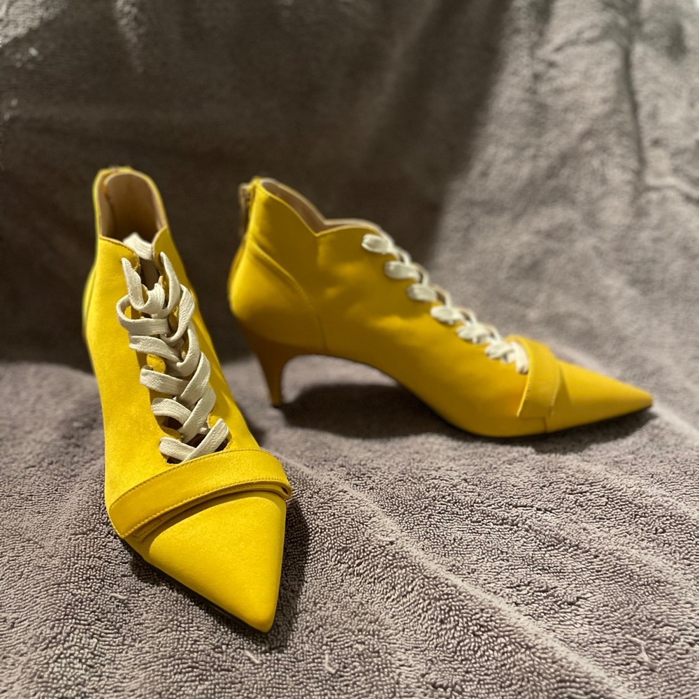 Yellow lace up kitten heels